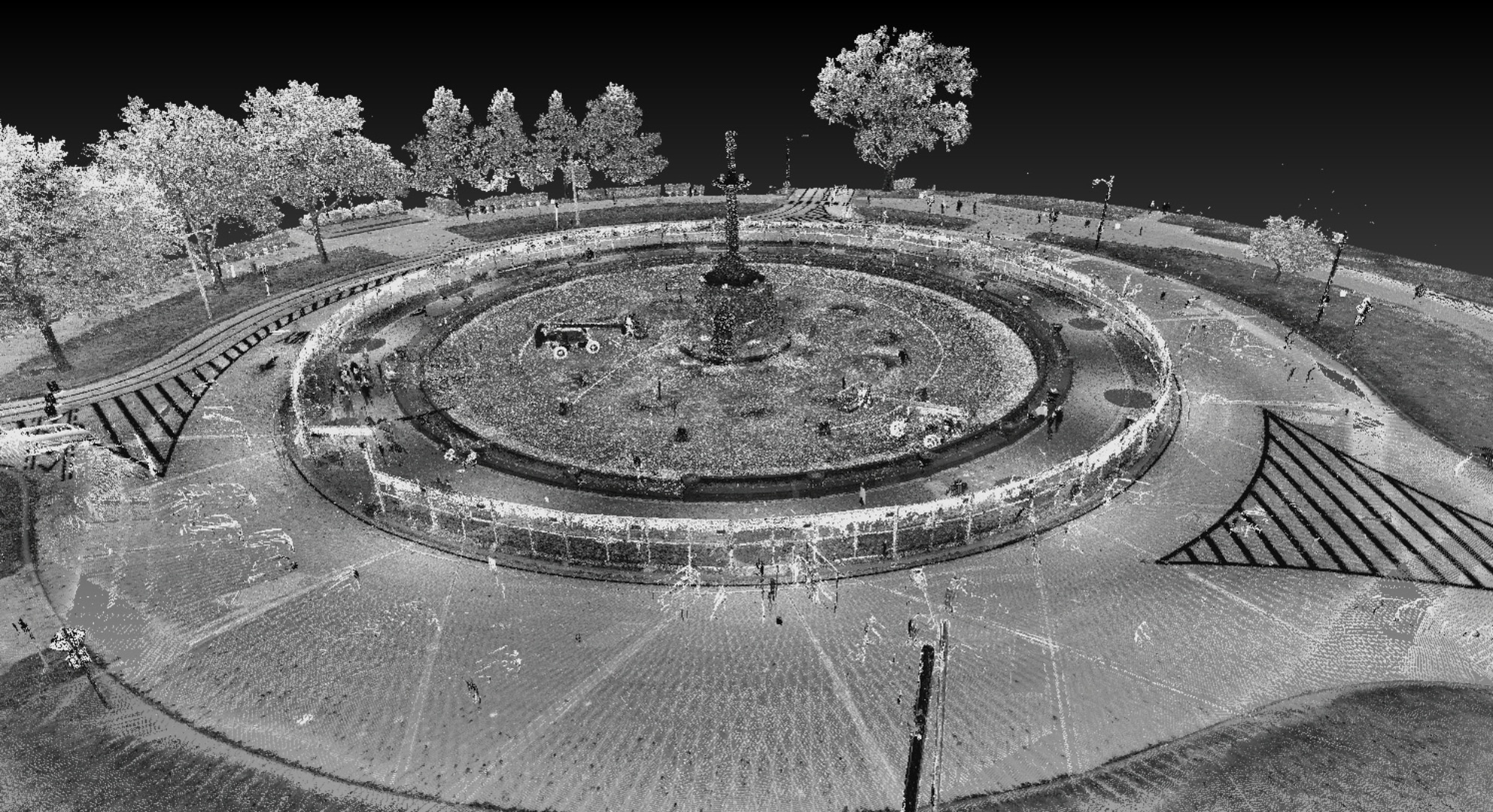 A grayscale 3D point cloud rendering of a circular park with a central fountain, surrounding walkways, benches, landscaping, and trees is perfect for large format printing.