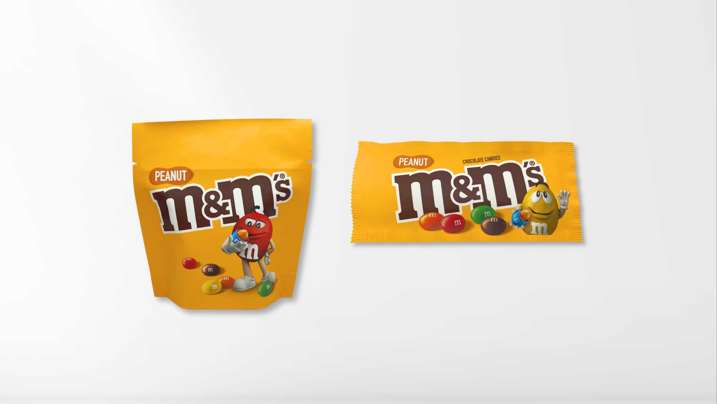 Packaging - Food - 50_50 Packaging of M&M's Peanut candy featuring a yellow resealable bag and a yellow pouch, both with images of the colorful candy and characters, brought to life with vibrant large format printing.